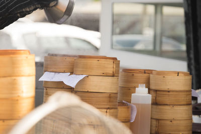 Close-up of man working on wooden table