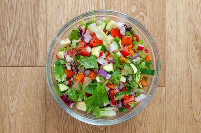 Directly above shot of chopped fruits in bowl on table