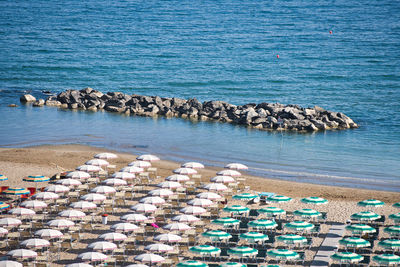 Rocky cliffs near bathing beach on the adriatic sea in italy