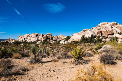 Rock formations against blue sky