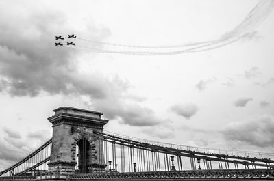 Low angle view of chain bridge against sky