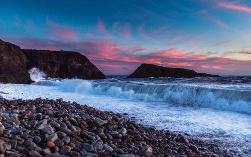 Scenic view of sea against sky during sunset