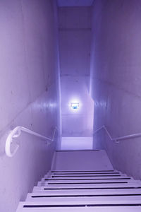 Low angle view of illuminated staircase in building