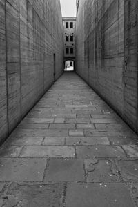 View of empty alley amidst buildings