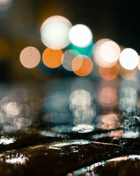 Close-up of illuminated lights at night