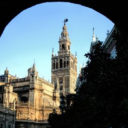 Low angle view of historic building against clear sky