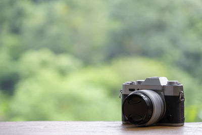 Close-up of camera on table