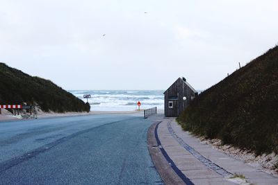 Empty road along sea