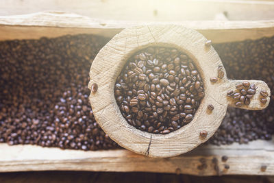Close-up of coffee beans on table