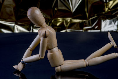 Close-up of rope tied on wooden table