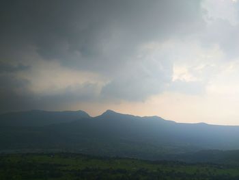 Scenic view of mountains against sky during sunset