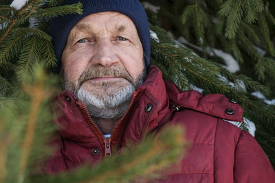 Portrait of man in park during winter