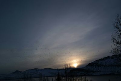 Scenic view of landscape against sky during sunset