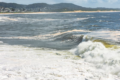 Waves rushing towards shore