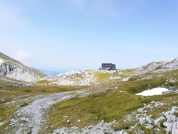 View of overhead cable car on snow covered mountain