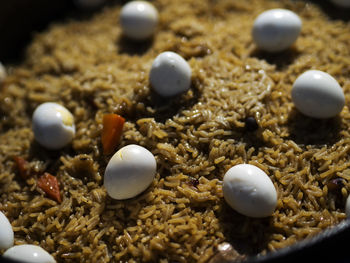 Uzbek pilaf served with boiled eggs. on holidays they use quail, on ordinary days they use chicken. 