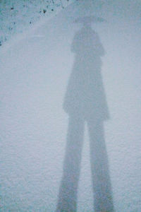 Shadow of woman on wall