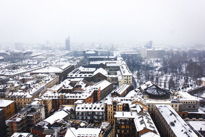 High angle view of buildings in city during winter