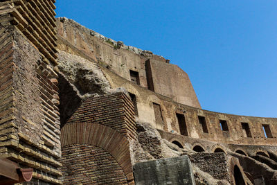 Low angle view of old ruin against clear sky