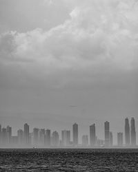 Skyline of panama city in a cloudy day seen from the water