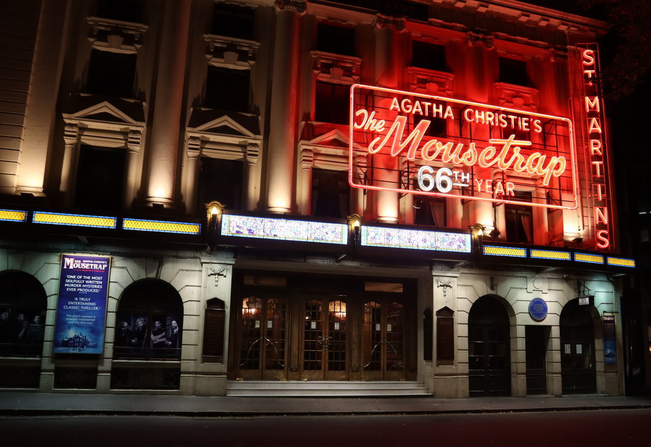 ILLUMINATED ENTRANCE OF BUILDING