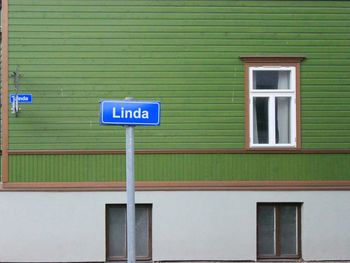 Information sign on wall of building