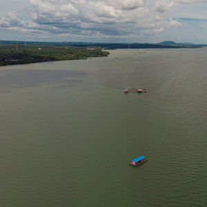 High angle view of boat in sea against sky