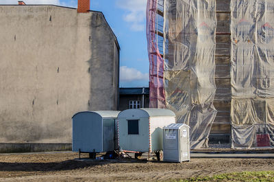 Panoramic view of abandoned building against sky