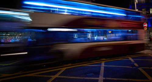 Blurred motion of train at railroad station platform