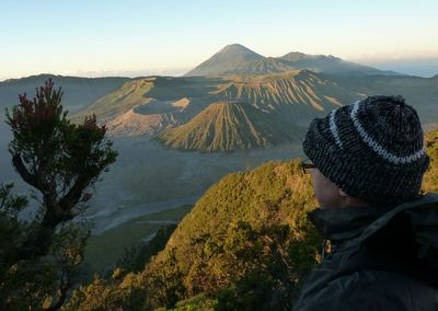 Side view of man standing at mount bromo