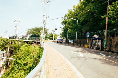 Cars on road against sky