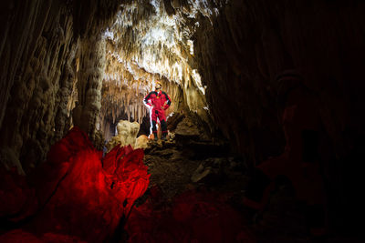 Man standing in cave