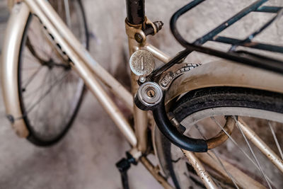 Close-up of bicycle parked on street