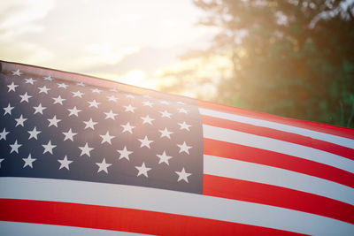 Close-up of flag against sky