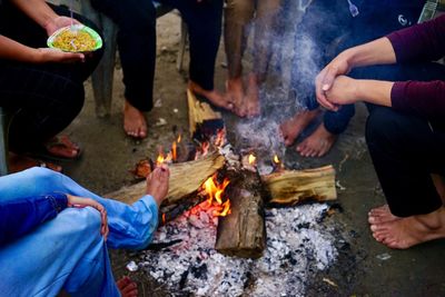 Group of people on barbecue grill