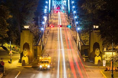 High angle view of light trails on road