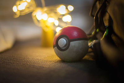 Close-up of illuminated ball on table