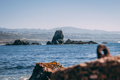 Scenic view of sea against clear sky