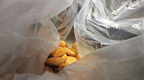 Close-up of almonds in bag
