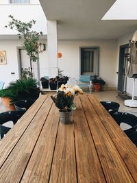 Flower vase on table at home