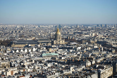 High angle view of city buildings against clear sky