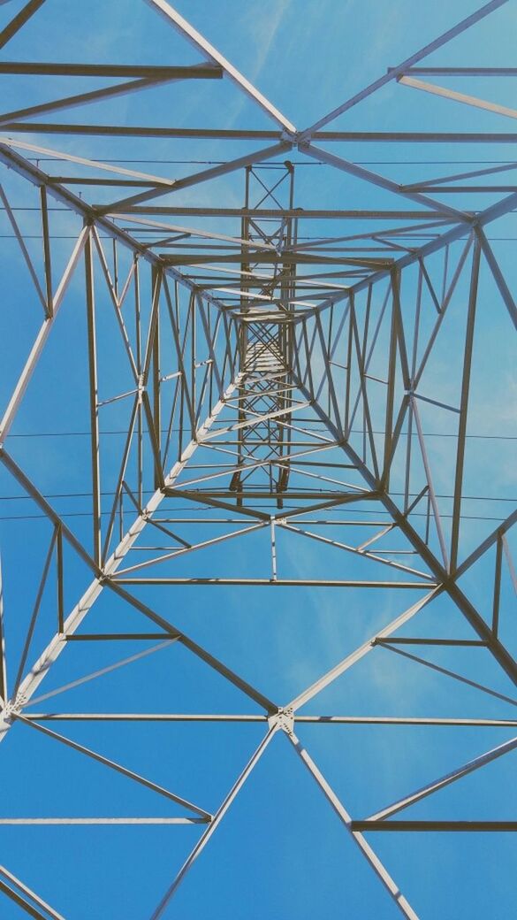 low angle view, connection, electricity, electricity pylon, power line, blue, fuel and power generation, power supply, clear sky, sky, technology, cable, directly below, metal, built structure, no people, day, backgrounds, pattern, outdoors