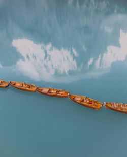 Aerial view of rowboat moored in lake