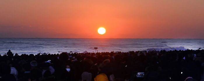 Scenic view of sea against clear sky during sunset
