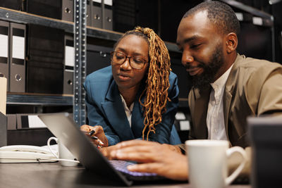 Business colleagues working at table