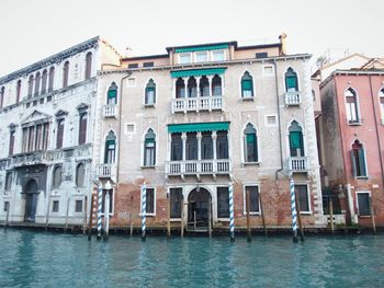 Grand canal against buildings in city