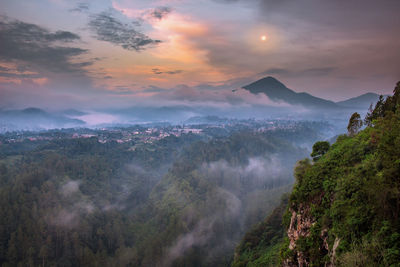 Scenic view of mountains against sky during sunset