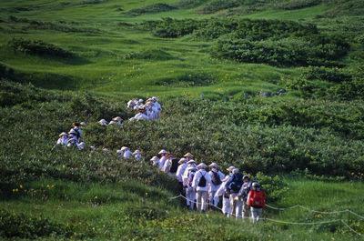 High angle view of people on field