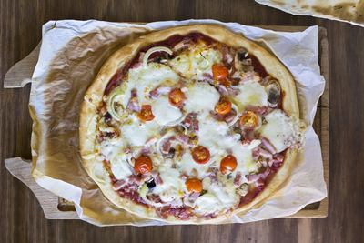 High angle view of pizza in plate on table