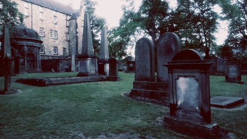 View of cemetery against trees